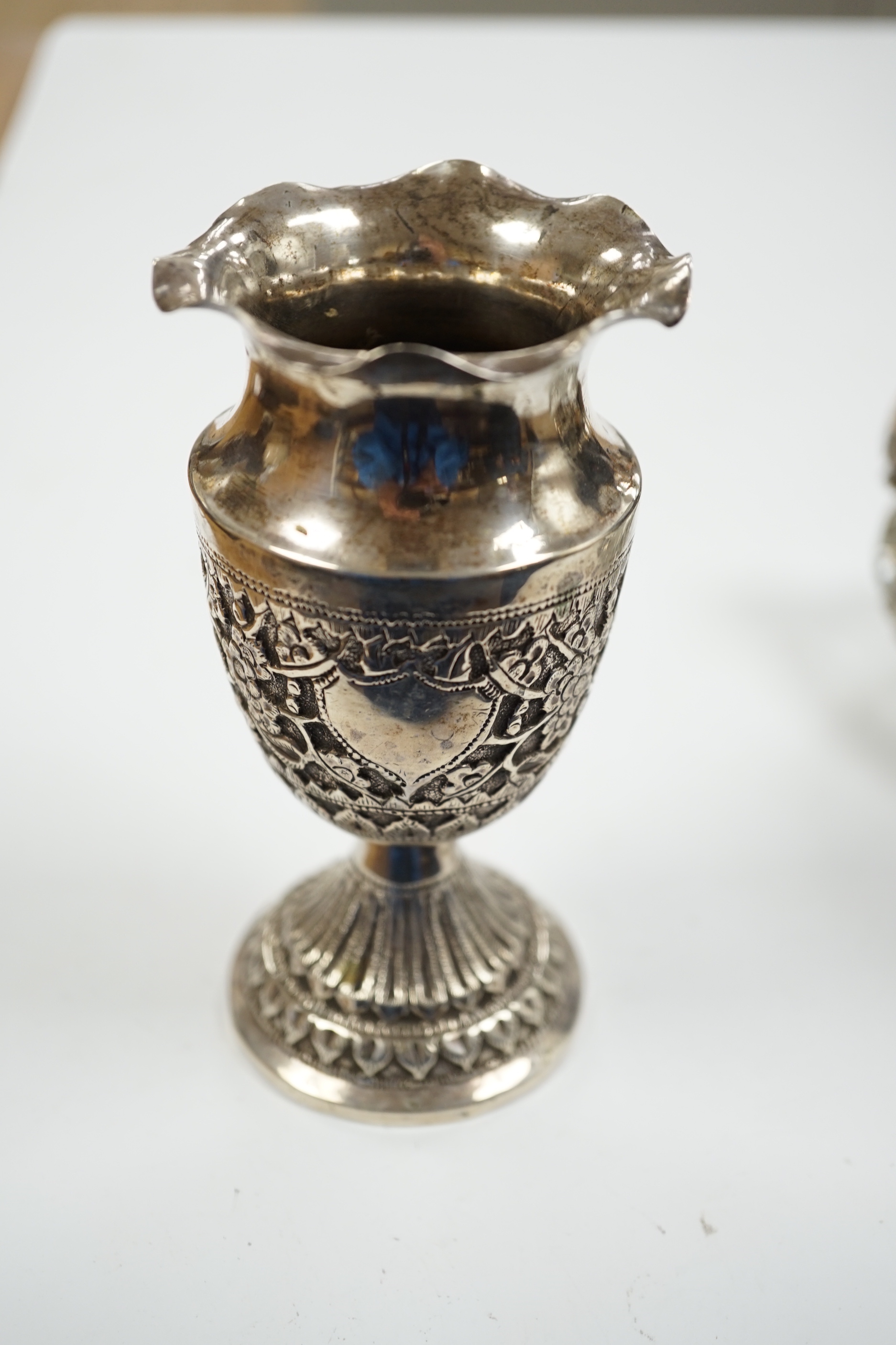 Two small white metal candlesticks, 8cm, an Indian vase, silver posy vase and a white metal mounted glass swan dish, a.f.